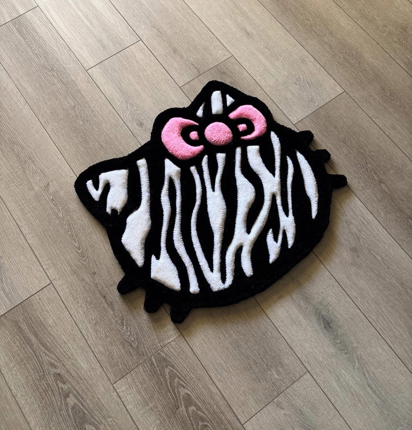 Zebra print kitty rug