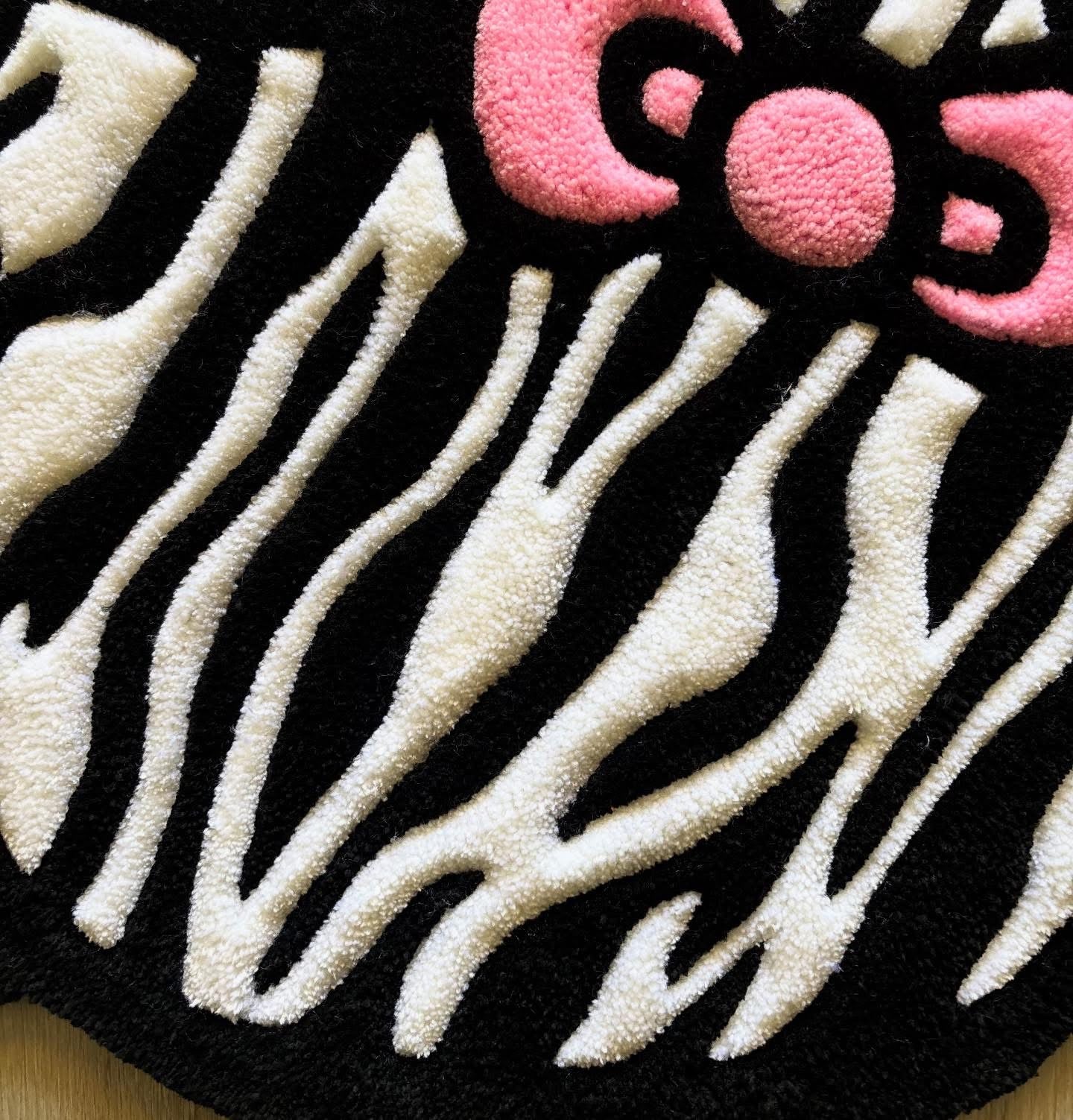 Zebra print kitty rug